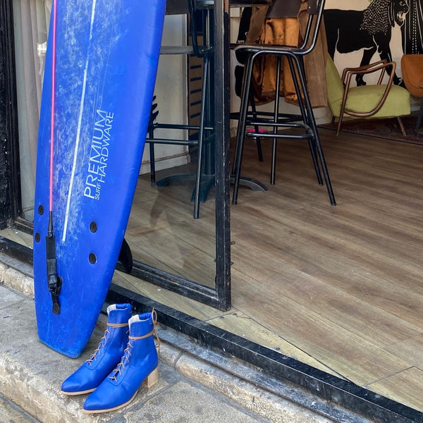 Blue lace up boots